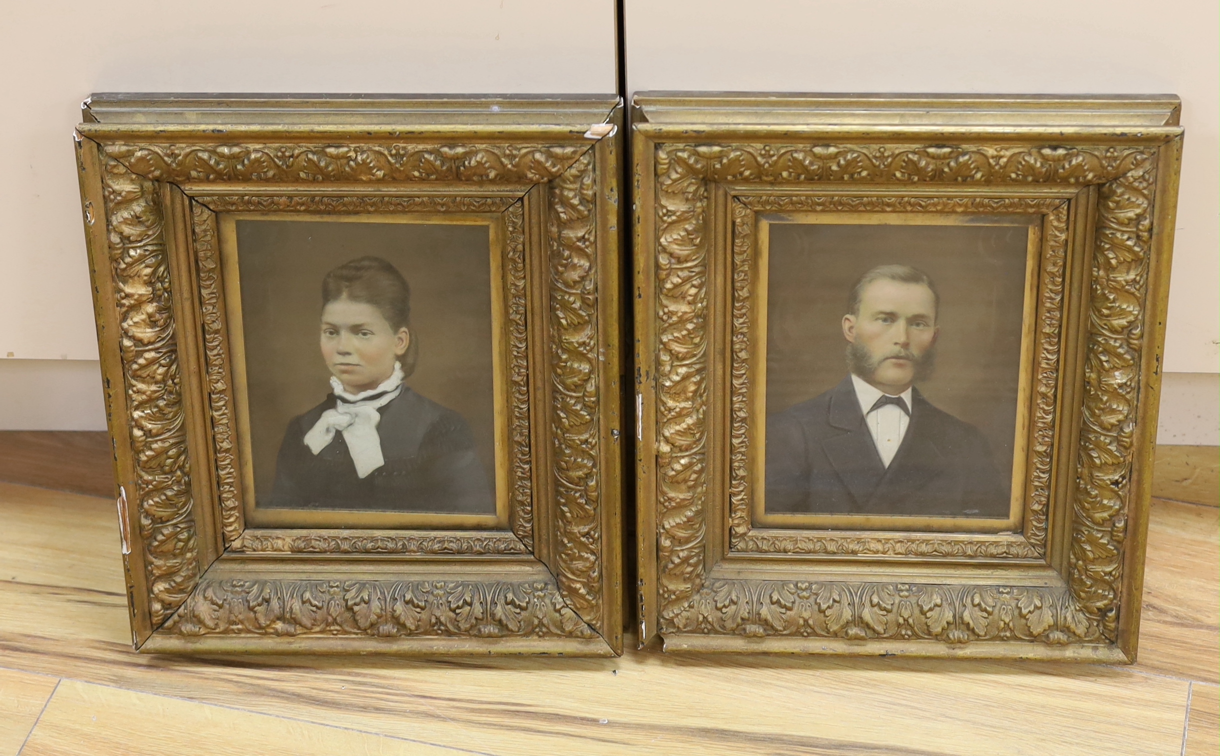 South African School, pair of overpainted 19th century photographs, Portraits of a Lady and Gentleman, 20 x 15cm, ornate moulded gilt frames